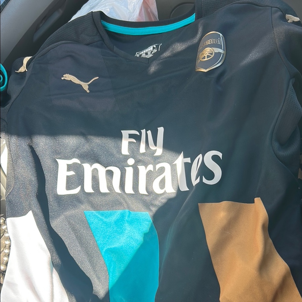 Puma Kids Black Jersey with Gold and Blue Accents
